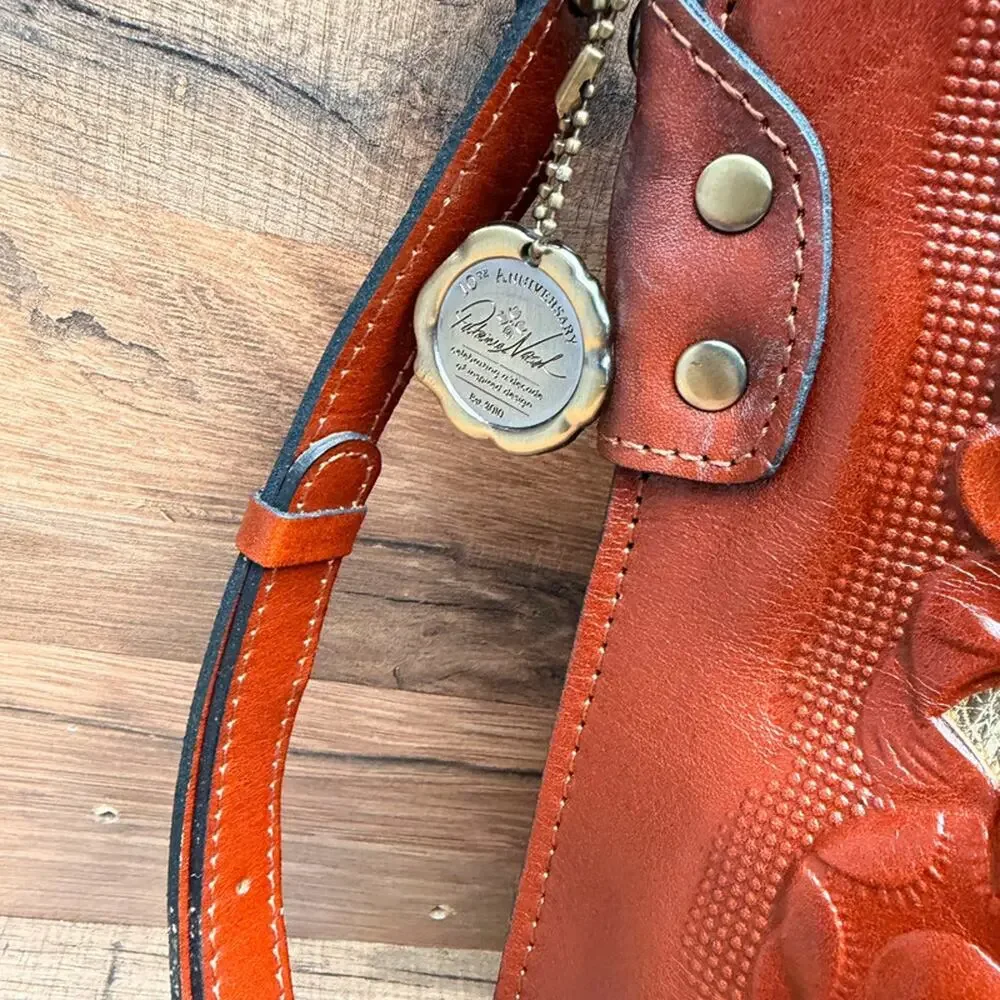 Patricia Nash Leather Accadia Bucket Drawstring Crossbody Bag Tan Cutout